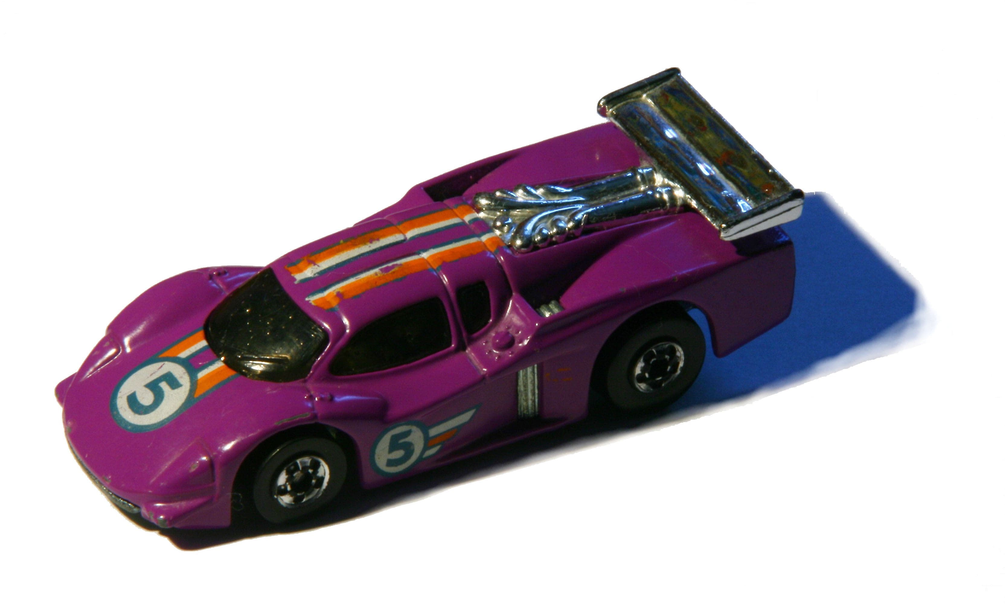 Purple vintage Hot Wheels race car with rear wing